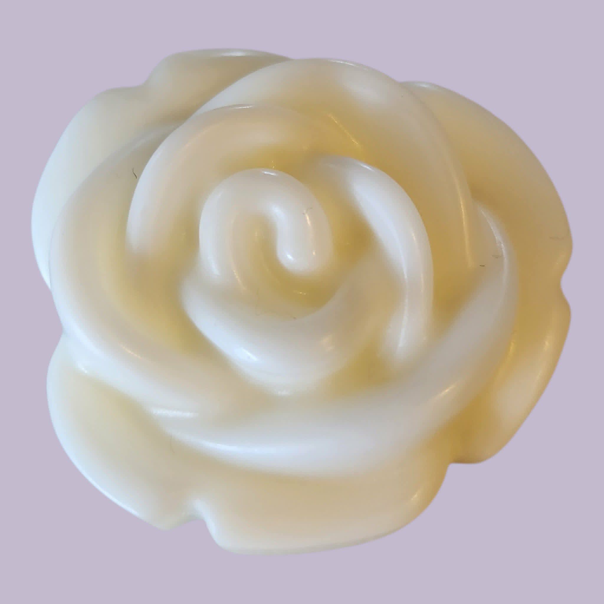 Rose-shaped melt on a pink background